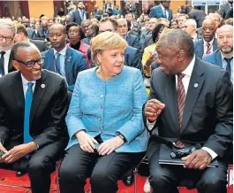  ?? /Jairus Mmutle ?? Making a point: President Cyril Ramaphosa engages with German Chancellor Angela Merkel and Rwandan President Paul Kagame at the Group of 20 investment summit which was held in Berlin, Germany, on Tuesday.