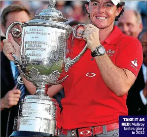  ??  ?? TAKE IT AS RED: McIlroy tastes glory in 2012