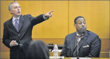  ?? KENT D. JOHNSON / AJC ?? APS principal Mario Watkins testifies as defense attorney Robert Rubin presents his case Wednesday. Watkins, who was an assistant principal at Dobbs Elementary school from 2008-2012, was called as the first witness for the defense in the long-running...