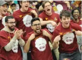  ??  ?? LEFT: Fans show off their Sister Jean T- shirts.