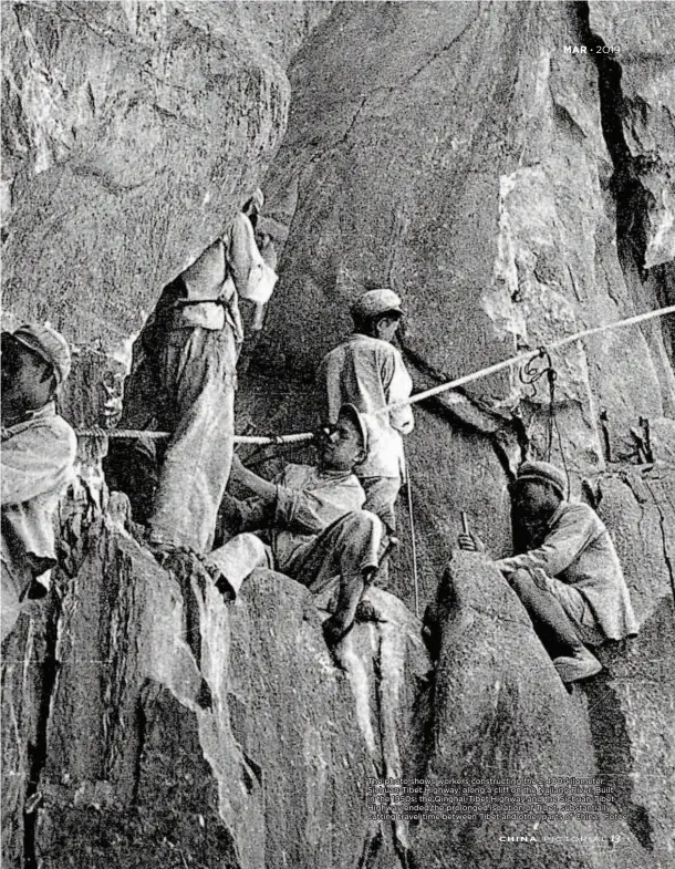  ??  ?? The photo shows workers constructi­ng the 2,400-kilometer Sichuan-tibet Highway, along a cliff on the Nujiang River. Built in the 1950s, the Qinghai-tibet Highway and the Sichuan-tibet Highway ended the prolonged isolation of Tibet, substantia­lly cutting travel time between Tibet and other parts of China. Fotoe