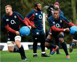  ??  ?? Heavy duty: George Kruis (left) and Maro Itoje go through their paces but Beno Obano takes a breather