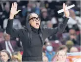  ?? SEAN RAYFORD/AP ?? South Carolina coach Dawn Staley gestures to players during the first half of a game against Clemson on Wednesday in Columbia, S.C.