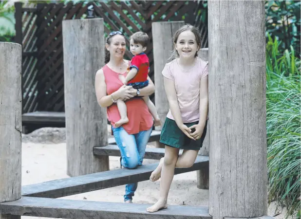  ?? Picture: STEWART MCLEAN ?? HEALTHY CHOICE: Rhiana Elder from Kanimbla ensures her children Harrison, 2, and Jaycee, 7, drink water rather than soft drinks.