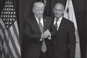  ?? CHIP SOMODEVILL­A/SIPA USA ?? U.S. President Donald Trump is joined by Homeland Security Secretary John Kelly during a visit to the Department of Homeland Security on Jan. 25 in Washington, D.C. While at the department Trump signed two executive orders related to domestic security...