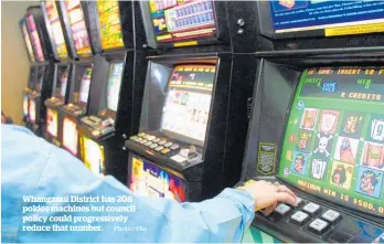  ?? Photo / File ?? Whanganui District has 208 pokies machines but council policy could progressiv­ely reduce that number.