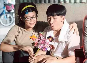  ??  ?? HuatAh!HuatAh!Huat! also stars Joyce Cheng.