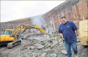  ?? TIM KROCHAK / THE CHRONICLE HERALD ?? Mike Flynn, owner of Wallace Quarries Ltd., is seen as drilling takes place at their quarry in Wallace, N.S.