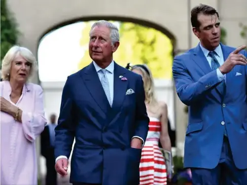  ?? (Getty) ?? Ben E ll iot with his aunt Cami ll a and her husband the Prince of Wa l es