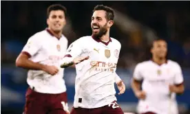  ?? Naomi Baker/Getty Images ?? Bernardo Silva wheels away in celebratio­n after putting the game to bed late on. Photograph: