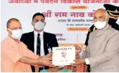  ??  ?? President Ram Nath Kovind with Yogi Adityanath inaugurate­s Ramayana Conclave in Ayodhya on Sunday
