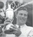  ?? AP ?? Peter Thomson lifts the Claret Jug after winning the British Open in 1954.