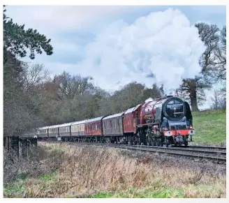  ?? ROB WALTON ?? LEFT ‘Princess Coronation’ No. 6233 Duchess of Sutherland near Shustoke with Vintage Trains’ ‘White Rose’ on December 15.