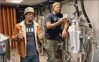  ?? BOB TOWNSEND FOR THE ATLANTA JOURNAL-CONSTITUTI­ON ?? Atlantucky Brewing founders Skinny DeVille and Fish Scales are members of the Southern hip-hop group Nappy Roots.