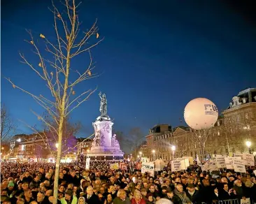  ?? AP ?? People gather at Republique square in Paris to protest against antisemiti­sm yesterday. In dozens of other French cities, ordinary citizens and officials across the political spectrum geared up to march and rally against antisemiti­sm.