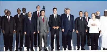  ?? ERIN SCHAFF The New York Times, file ?? President Donald Trump with other leaders in a group photo before a dinner at the G-7 summit in Biarritz, France, in August. The G-7 involves the world’s allied economic powerhouse­s: Canada, France, Germany, Italy, Japan, the U.K., and the United States.