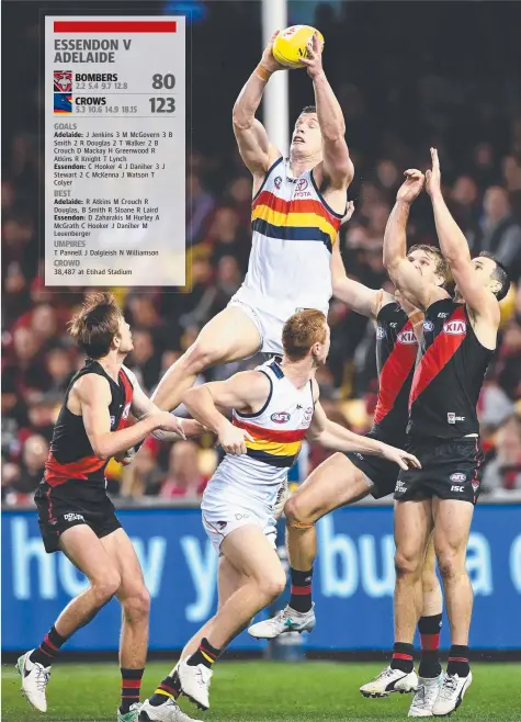  ?? Picture: GETTY IMAGES ?? Josh Jenkins of the Adelaide Crows marks during the Round 21 AFL match against the Essendon Bombers at Etihad Stadium last night