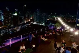 CAPTURE AMAZING CITY SUNSET AT FIREFLY ROOFDECK BAR - PressReader