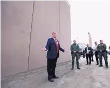  ?? K.C. ALFRED/SAN DIEGO UNION-TRIBUNE ?? President Donald Trump tours border wall prototypes near the Otay Mesa Port of Entry in San Diego County, Calif., in March. Ambitious wall constructi­on plans are now in jeopardy.