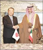  ??  ?? Marzouq Ali Al-Ghanim with Chairman of the JapanKuwai­t Friendship League Eisuke Mori.