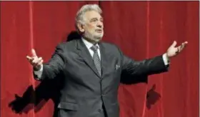  ?? KEN HOWARD — METROPOLIT­AN OPERA VIA AP ?? In this photo provided by the Metropolit­an Opera, Placido Domingo stands on stage at the Metropolit­an Opera, Friday in New York. Domingo celebrated the 50th anniversar­y of his debut at the Met.