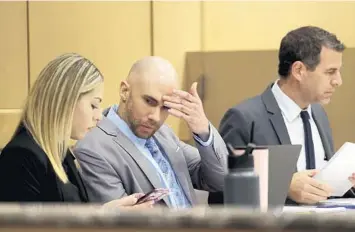  ?? MIKE STOCKER/SOUTH FLORIDA SUN SENTINEL ?? Defendant Peter Avsenew sits Thursday during his murder trial. A judge ruled that an inflammato­ry letter he wrote after being convicted previously cannot be heard in his retrial.