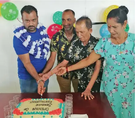  ?? ?? From left: Chief guest and FijiFirst candidate, Alvick Maharaj, Nabouwalu Seaside Tasty Halal Restaurant owner Ritu Raj Narayan, father Khem Raj Narayan and mother Indra Wati Narayan during the opening of the restaurant on November 12, 2022