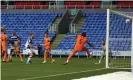  ??  ?? Yakou Méïté heads in Reading’s stoppage-time equaliser against Cardiff. Photograph: Andrew Fosker/BPI/Shuttersto­ck