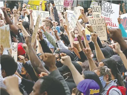  ?? GAVIN YOUNG ?? Several thousand Calgarians participat­ed in an anti-racist rally in downtown Calgary on June 1.