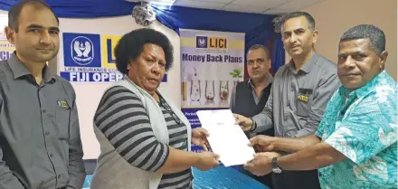  ?? Photo: Laiseana Nasiga ?? From left: Life Insurance Coproratio­n of India manager underwritn­g Guatam Kumar, Venaisi Tinai Coriakula, manager for finance, investment and human resources Sanjeev Garg, general manager Fiji operations YS Ashok and Tomasi Coriakula druing the cheque handover on Thursday 11, 2020.