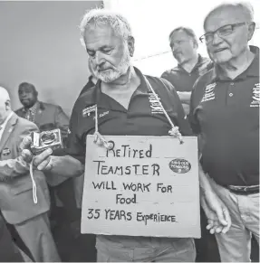  ?? USA TODAY NETWORK ?? Jan D. Kachur, 75, of Deerfield, Mich., attends the town hall meeting at the Teamsters Health and Welfare Building in Detroit in July. Kachur worked for 35 years at Central Transport in Detroit.