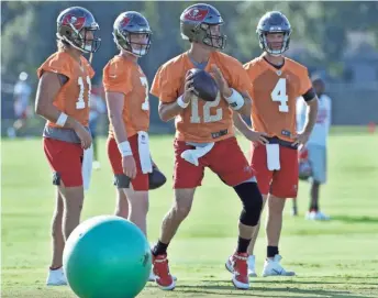  ?? ASSOCIATED PRESS ?? At 43, quarterbac­k Tom Brady has a new challenge with the Tampa Bay Buccaneers.