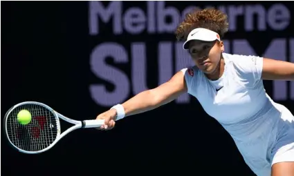  ?? AP Photo/Andy Brownbill ?? Japan’s Naomi Osaka makes a forehand return to Britain’s Katie Boulter during a tuneup event ahead of the Australian Open tennis championsh­ips in Melbourne, Australia, on Wednesday.