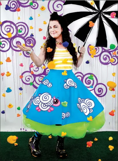  ??  ?? Amy Lee, the two-time Grammy-winning lead singer of rock band Evanescenc­e, has recorded Dream Too Much, a children’s album, with her father, sisters and other family members.