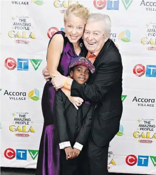  ?? COURTESY OF PEGGY TAILLON ?? Max Keeping, with Peggy Taillon and her son Devlin, at the CTV Amazing People Gala in February 2014. Keeping gave her the strength to go through the adoption process, Taillon writes.