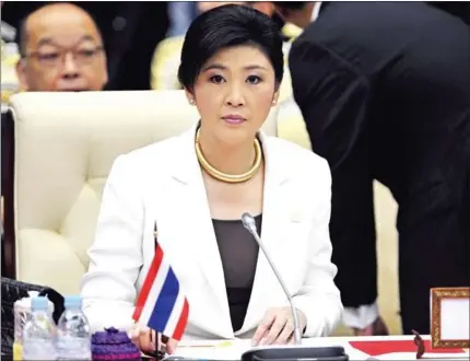  ?? TANG CHHIN SOTHY/AFP ?? The then prime minister of Thailand Yingluck Shinawatra looks on during the opening ceremony of the 20th Associatio­n of Southeast Asian Nations (Asean) summit in Phnom Penh on April 3, 2012.