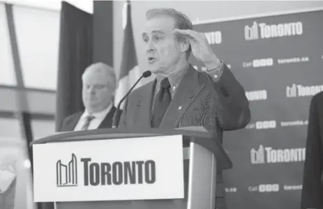  ?? RENÉ JOHNSTON/TORONTO STAR ?? Deputy Mayor Norm Kelly, right, and Mayor Rob Ford are caught in an “awkward” power-sharing arrangemen­t, some councillor­s say.