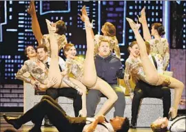  ?? Theo Wargo Getty Images for Tony Awards Production­s ?? HOST James Corden, center, skimpy attire are among complaints about Tonys.