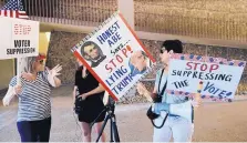  ?? ERIC GAY/ASSOCIATED PRESS ?? Protesters gather in 2017 outside the federal courthouse in San Antonio, where a redistrict­ing trial was taking place.