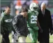  ?? BILL KOSTROUN - THE ASSOCIATED PRESS ?? New York Jets running back Bilal Powell (29) is helped off the field after being hurt during the first half of an NFL football game against the Minnesota Vikings Sunday, Oct. 21, 2018, in East Rutherford, N.J.