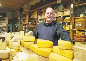  ?? Frank Whitman / For Hearst Connecticu­t Media ?? Ken Skovron at Darien Cheese sources cheeses made with traditiona­l methods that are “real food.”