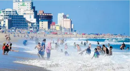  ?? CAITLIN FAW/BALTIMORE SUN ?? Ocean City is likely to draw a crowd over Labor Day weekend, and the roads there are likely to be just as crowded.