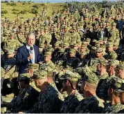  ?? ROBERT BURNS / AP ?? Defense Secretary Jim Mattis talks to troops at Guantanamo Bay, Cuba, on Thursday. The unannounce­d visit was the first by a defense secretary since Donald Rumsfeld visited in January 2002.