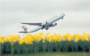  ?? ADRIAN DENNIS AFP/GETTY IMAGES FILE PHOTO ?? Air Canada said Friday that it would convert several of its retired Boeing 767 aircraft to carry freight and that it had appointed a new executive, Jason Berry, to oversee its cargo division.