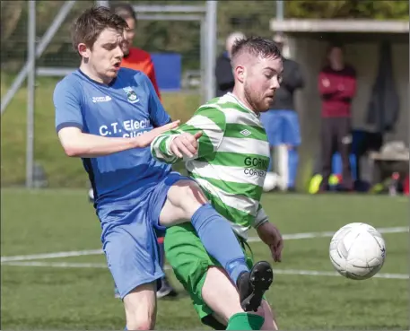  ??  ?? Steven Armstrong of St John’s in action with Ballymote’s Robbie Flannery at the Astro in Cleveragh. Pic: Donal Hackett.