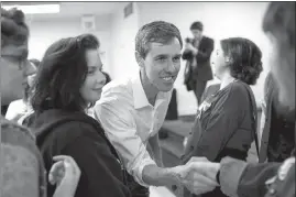  ?? TAMIR KALIFA / THE NEW YORK TIMES ?? Texas Rep. Beto O’rourke, a Democrat running for a Senate seat, greets supporters at the Brandon Community Center after a town hall event in Luf kin, Texas.