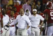  ?? BUTCH DILL — ASSOCIATED PRESS ?? Alabama coach Nick Saban yells to defensive lineman Raekwon Davis (99) after a penalty during the second half of the team’s NCAA college football game against Missouri, Saturday, Oct. 13, 2018, in Tuscaloosa, Ala.