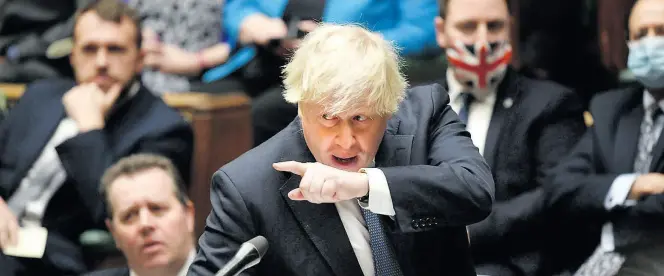  ?? Dpa-BILD: Taylor ?? Der britische Premier Boris Johnson steht Rede und Antwort im Unterhaus. Zur Pandemie ist seine Position klar: Alles ist in Ordnung.