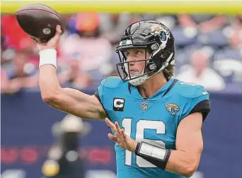  ?? Yi-Chin Lee/Staff photograph­er ?? Trevor Lawrence of the Jaguars has the best quarterbac­k rating among starters since Week 9 (108.2), throwing 14 touchdown passes and just one intercepti­on in that span.