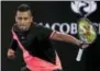  ?? DITA ALANGKARA — THE ASSOCIATED PRESS ?? Nick Kyrgios celebrates after defeating Jo-Wilfried Tsonga in the third round at the Australian Open on Friday.